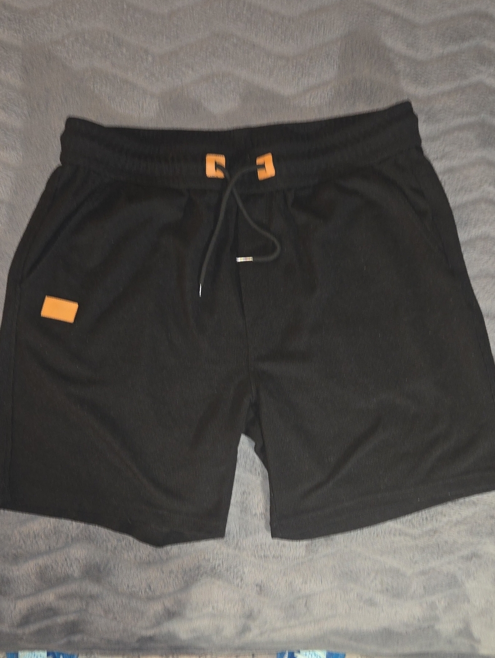 Men's Black Athletic Shorts with Orange Accents - Drawstring Performance